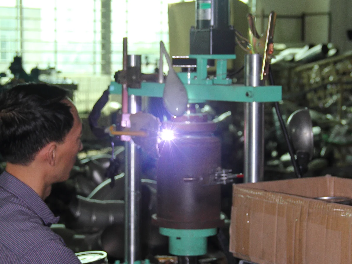 Precision forming and welding tooling in operation