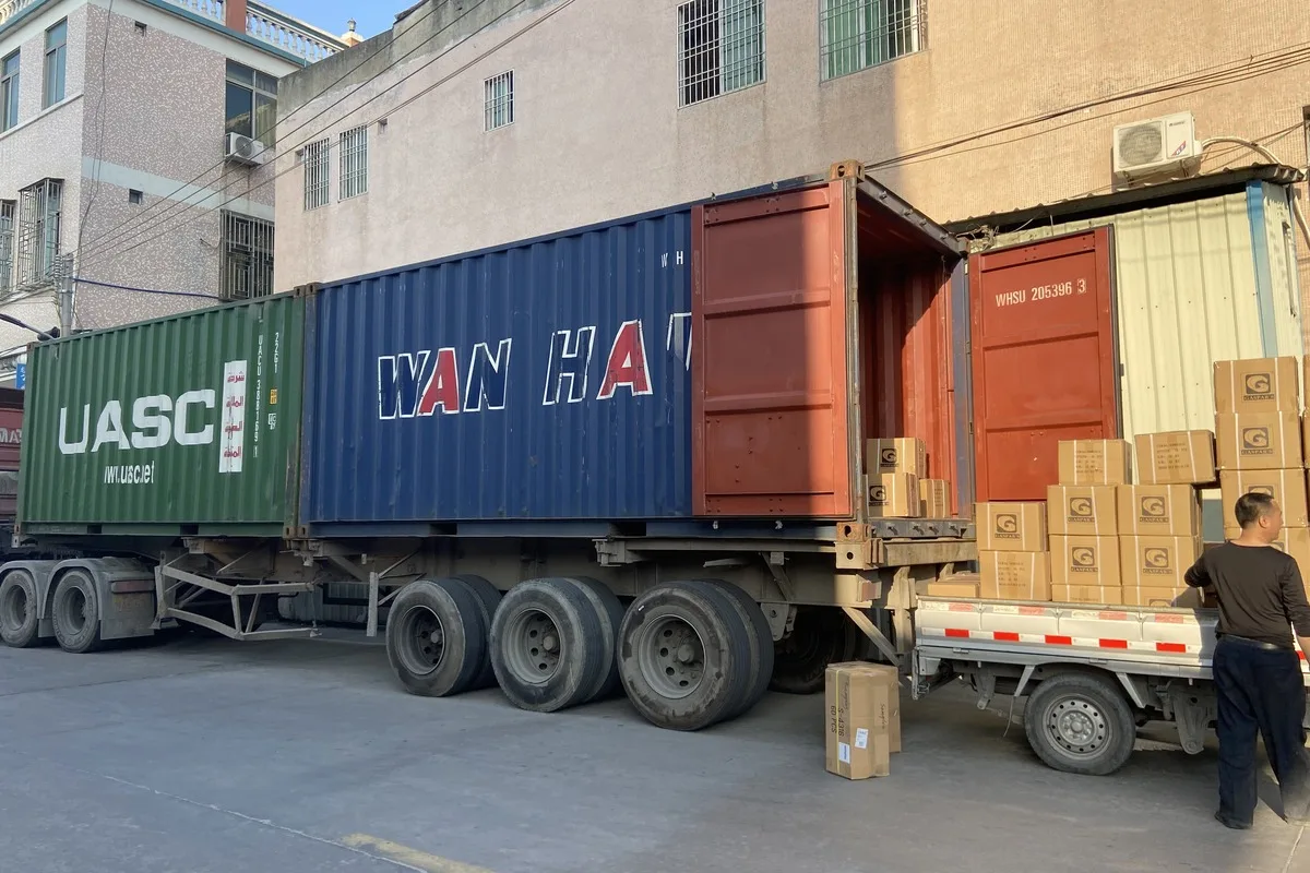 Sea freight container loaded with stainless steel kitchenware